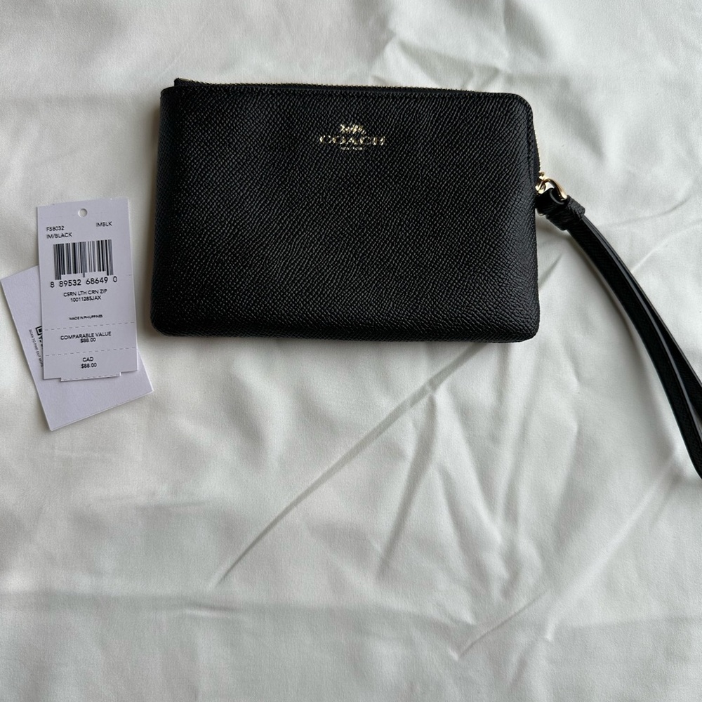 Coach Black Wristlet with Gold Accents